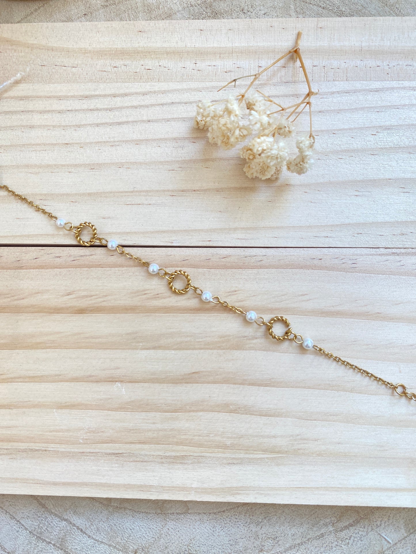Gedrehte Ringe mit Perle Gold