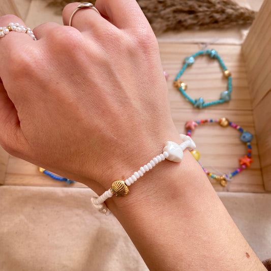 Armband elast. Muschel/Gold