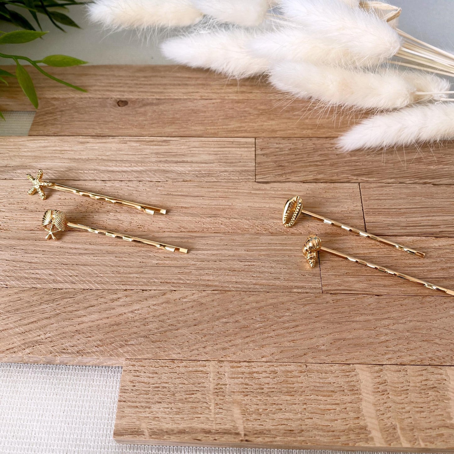Haarnadel Muschel -Gold-