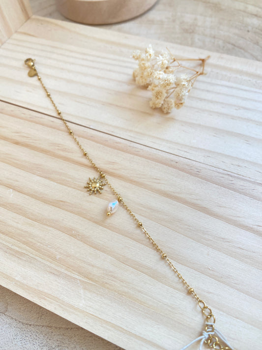 Sonne mit Perle Gold